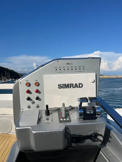  Yacht Photos Pics Control panel of a 2017 Riva 76' Perseo yacht with Simrad navigation system.