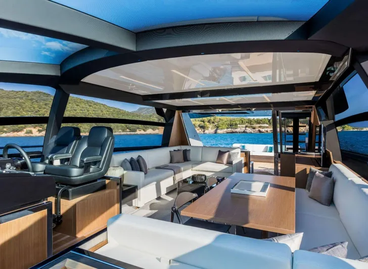  Yacht Photos Pics Luxurious interior of 2017 Riva 76' Perseo yacht with modern seating and scenic views.