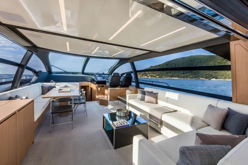  Yacht Photos Pics Luxurious interior of 2017 Riva 76' Perseo yacht with modern seating and panoramic views.