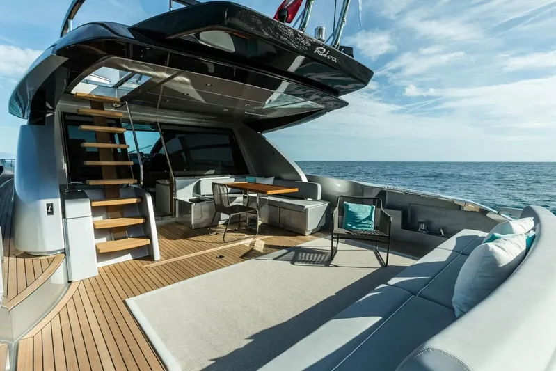  Yacht Photos Pics Luxurious 2017 Riva 76' Perseo yacht deck with modern seating and ocean view.