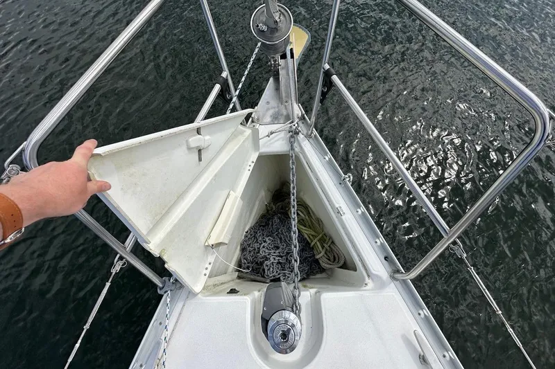 Tina C Yacht Photos Pics Anchor locker of a 2001 Beneteau 361 sailboat with chain and rope.