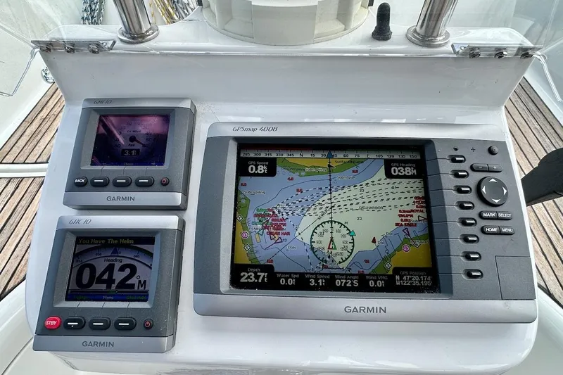 Tina C Yacht Photos Pics Garmin navigation system on 2001 Beneteau 361 sailboat, displaying maps and sailing data.