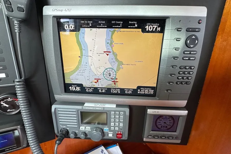 Tina C Yacht Photos Pics Navigation system on a 2001 Beneteau 361 sailboat, displaying GPS map and controls.