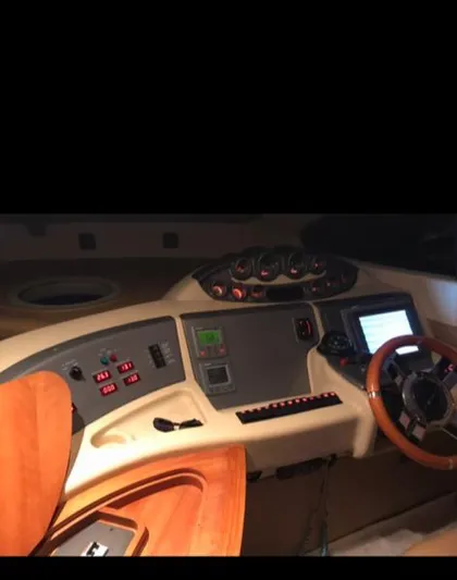  Yacht Photos Pics 2008 Azimut Flybridge yacht control panel with steering wheel and navigation instruments.
