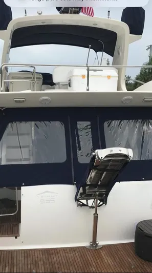  Yacht Photos Pics 2008 Azimut Flybridge yacht with upper deck and rear boarding ladder.