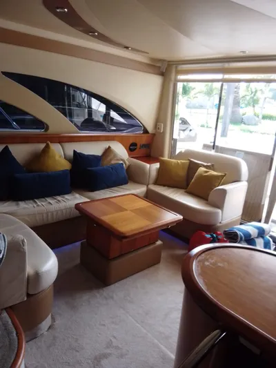  Yacht Photos Pics Luxurious interior of a 2008 Azimut Flybridge yacht with plush seating and elegant decor.