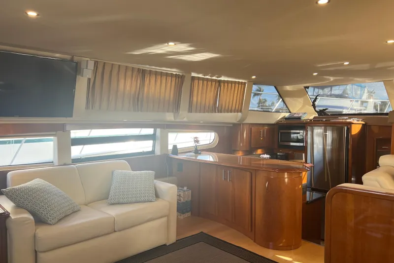 Ne Sea Yacht Photos Pics Luxurious interior of 2004 Carver 466 MY yacht with modern kitchen and comfortable seating.