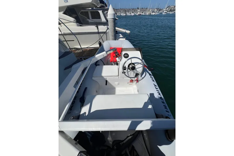 Ne Sea Yacht Photos Pics 2004 Carver 466 Motor Yacht docked, featuring a sleek white deck and steering wheel.