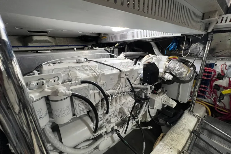 Ne Sea Yacht Photos Pics Engine room of a 2004 Carver 466 Motor Yacht, showcasing detailed mechanical components.