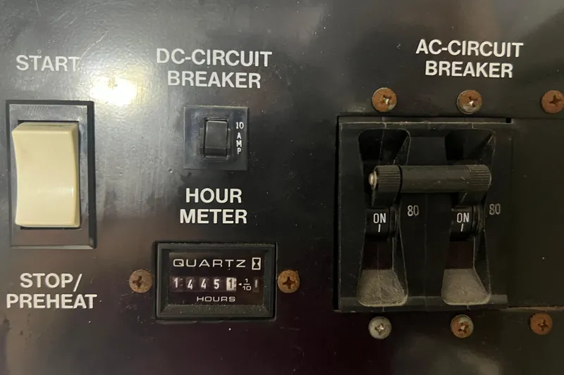 Ne Sea Yacht Photos Pics Control panel of a 2004 Carver 466 Motor Yacht with circuit breakers and hour meter.