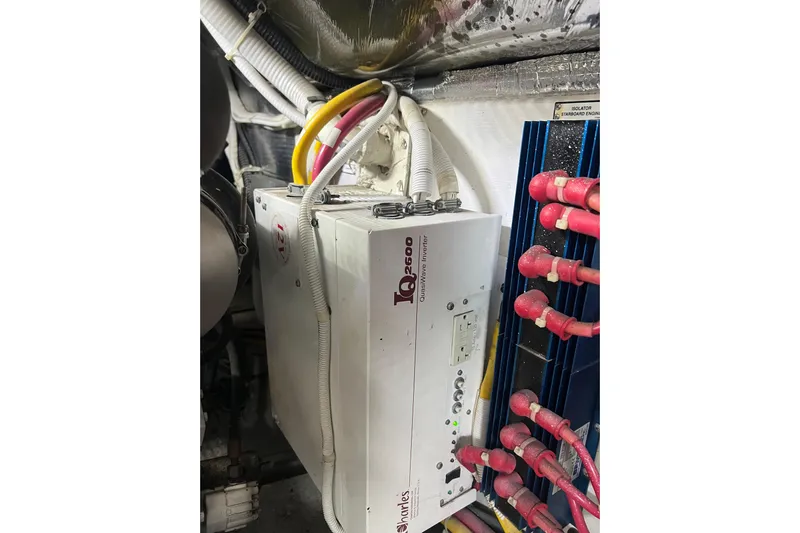 Ne Sea Yacht Photos Pics Electrical system in a 2004 Carver 466 MY yacht engine room with inverter and cables.