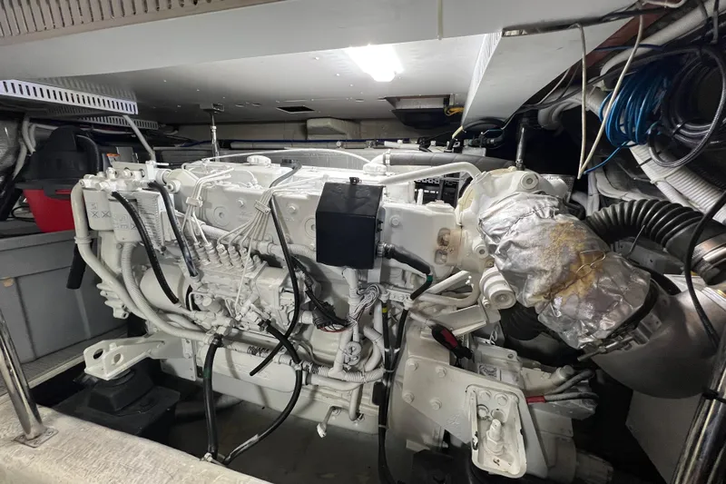 Ne Sea Yacht Photos Pics Engine room of a 2004 Carver 466 MY yacht, showcasing detailed machinery.