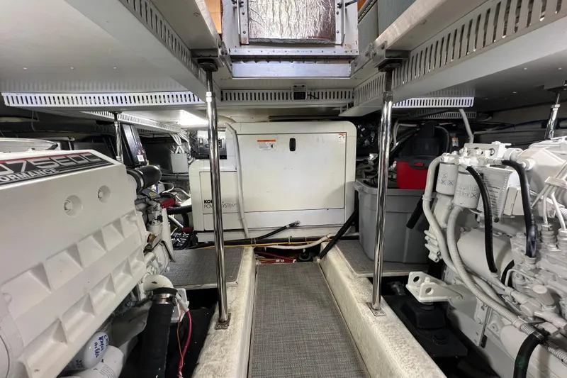 Ne Sea Yacht Photos Pics Engine room of a 2004 Carver 466 MY yacht, featuring mechanical systems and equipment.