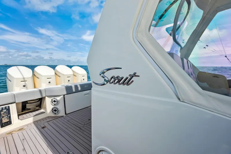 Bottom Line Yacht Photos Pics 2022 Scout LXF boat with multiple engines on open water.