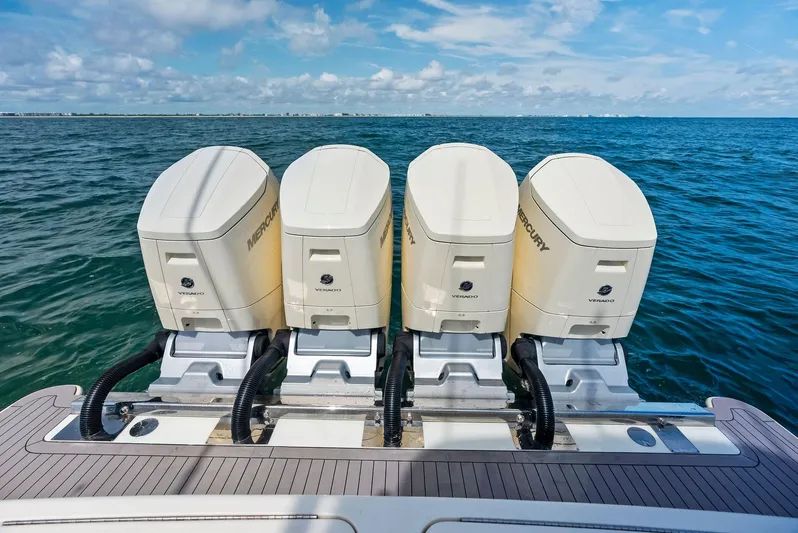 Bottom Line Yacht Photos Pics 2022 Scout LXF boat with four Mercury outboard engines on open water.