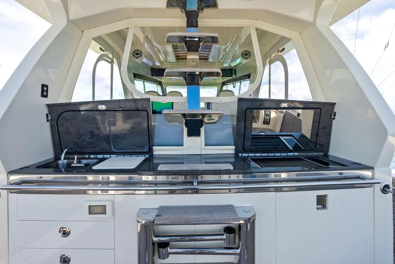 Bottom Line Yacht Photos Pics 2022 Scout LXF yacht kitchen with modern appliances and sleek design.