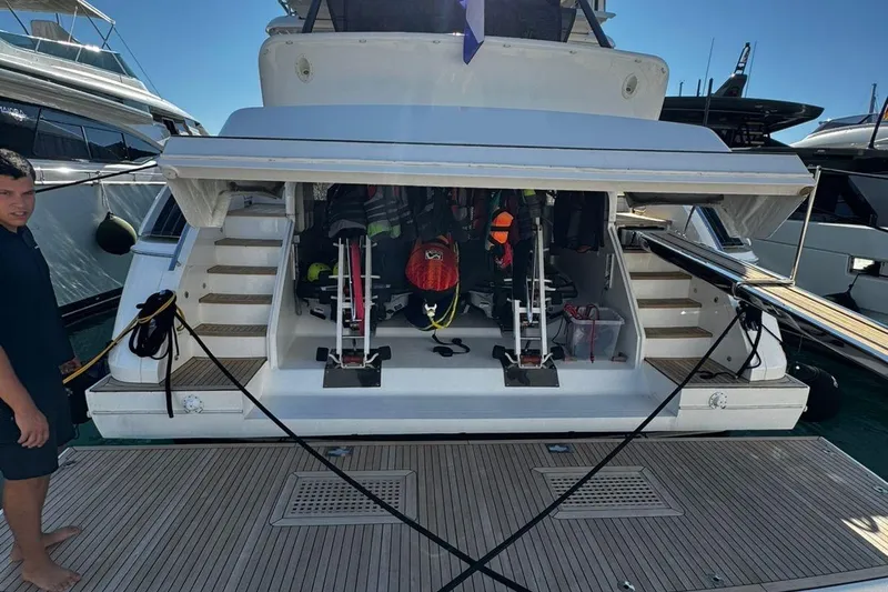  Yacht Photos Pics Luxury yacht Princess V85, 2008 model, with open storage and water sports equipment.