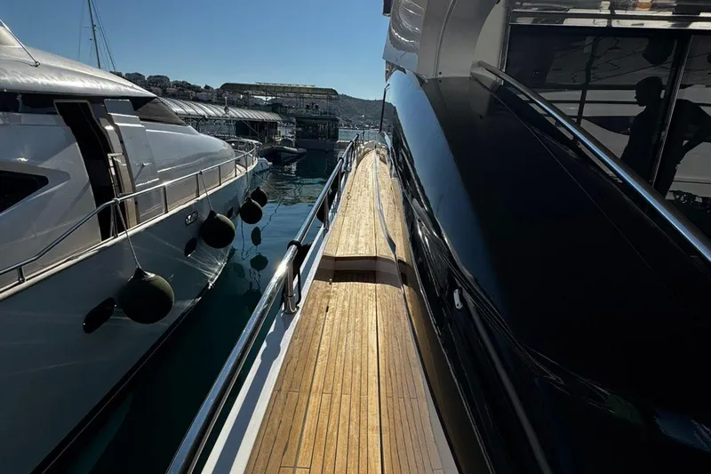  Yacht Photos Pics Side view of a 2008 Princess V85 yacht docked at a marina.