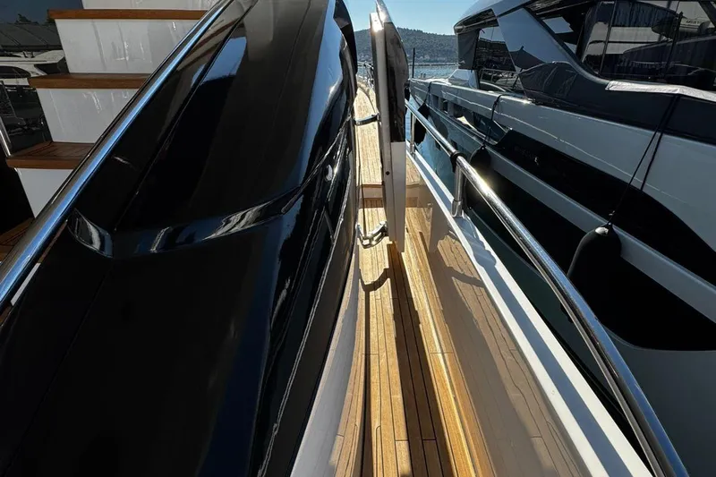  Yacht Photos Pics Side view of 2008 Princess V85 yacht with sleek black and white design.