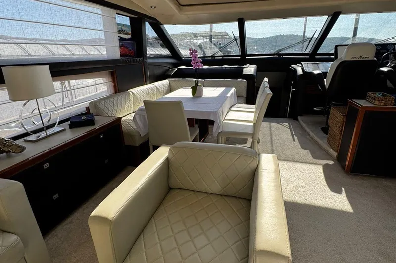  Yacht Photos Pics Luxurious interior of 2008 Princess V85 yacht with elegant seating and dining area.