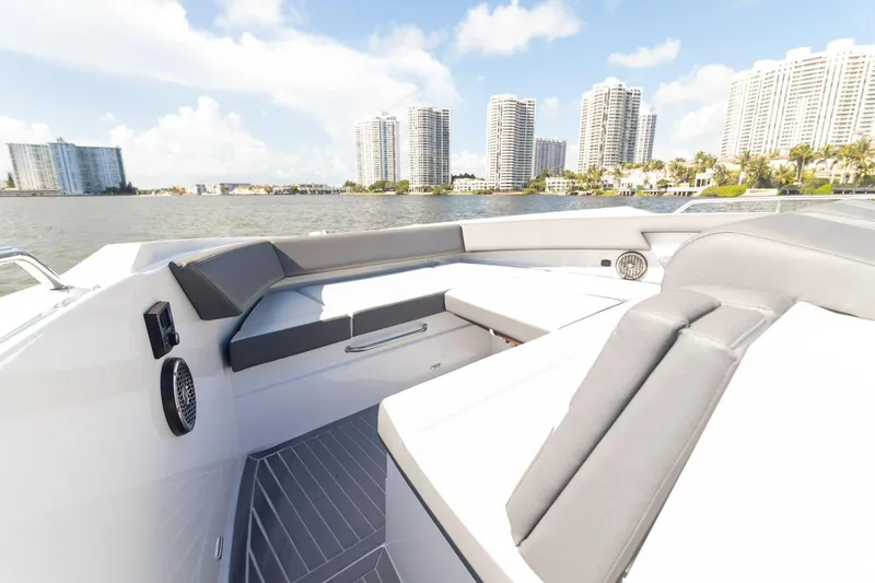  Yacht Photos Pics 2021 Cruisers Yachts 38 GLS boat interior with city skyline in background.