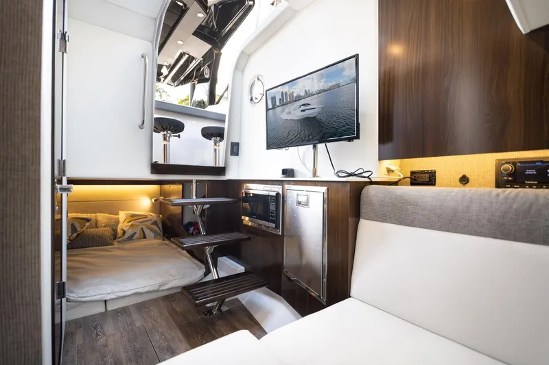  Yacht Photos Pics Interior of 2021 Cruisers Yachts 38 GLS, featuring modern amenities and cozy seating.