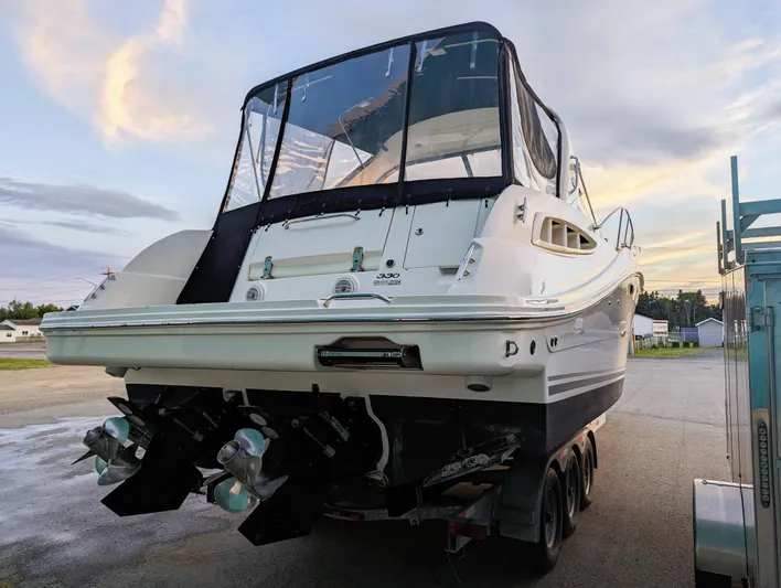  Yacht Photos Pics 2008 Sea Ray 330 Sundancer boat on trailer, rear view, with dual propellers.
