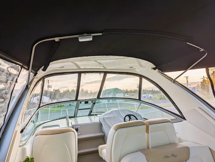  Yacht Photos Pics 2008 Sea Ray 330 Sundancer interior with covered helm and seating area.