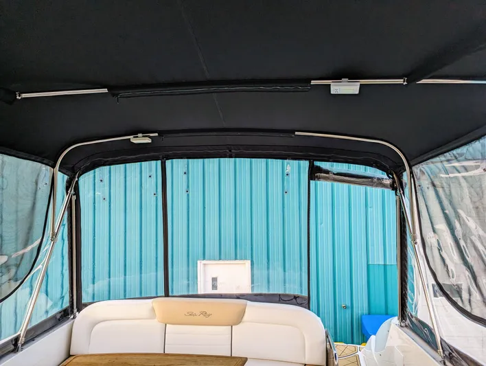  Yacht Photos Pics Interior view of 2008 Sea Ray 330 Sundancer boat with canopy and seating.