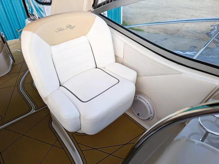  Yacht Photos Pics White captain's chair on 2008 Sea Ray 330 Sundancer boat, featuring elegant design and comfort.