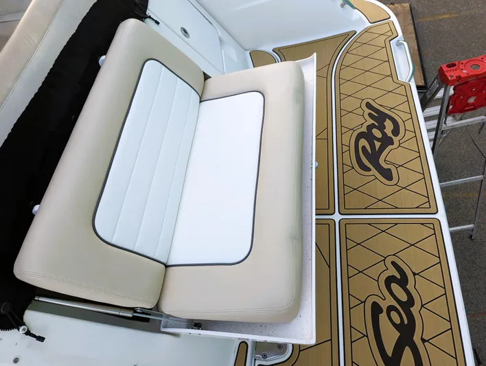  Yacht Photos Pics 2008 Sea Ray 330 Sundancer boat interior with beige seating and custom Sea Ray flooring.