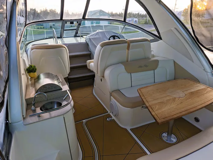  Yacht Photos Pics 2008 Sea Ray 330 Sundancer interior with seating, table, and kitchenette.