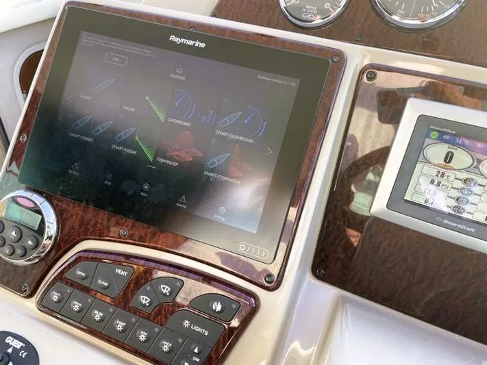  Yacht Photos Pics Control panel of a 2008 Sea Ray 330 Sundancer boat with Raymarine display.