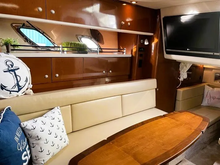  Yacht Photos Pics Luxurious interior of 2008 Sea Ray 330 Sundancer with plush seating and modern amenities.