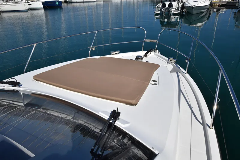 Indian Summer Yacht Photos Pics 2016 Sealine C330 yacht with sunpad, docked in a marina.