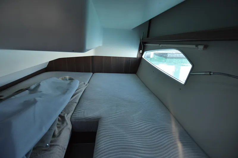 Indian Summer Yacht Photos Pics Interior cabin of 2016 Sealine C330 yacht with bed and window view.