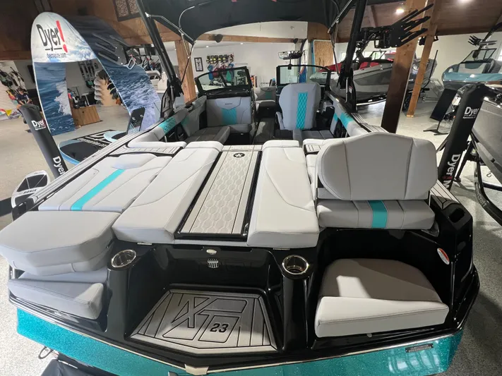  Yacht Photos Pics 2025 MasterCraft XT23 boat interior with sleek seating and modern design.