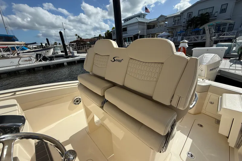  Yacht Photos Pics 2026 Scout 288 LXF boat interior with luxurious seating at marina.