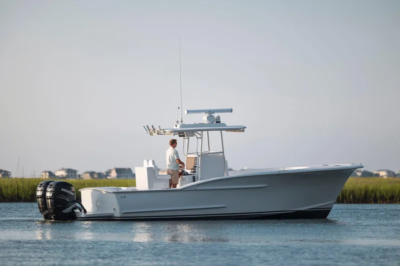  Yacht Photos Pics 2019 Willis 33 Center Console boat on calm water.
