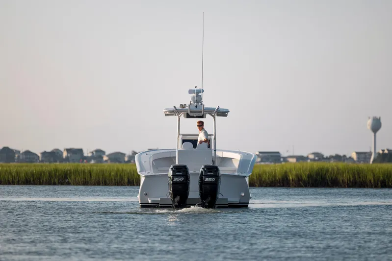  Yacht Photos Pics 2019 Willis 33 Center Console boat on water with twin engines.