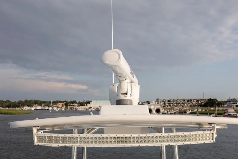  Yacht Photos Pics 2019 Willis 33 Center Console boat radar system on a calm waterway.