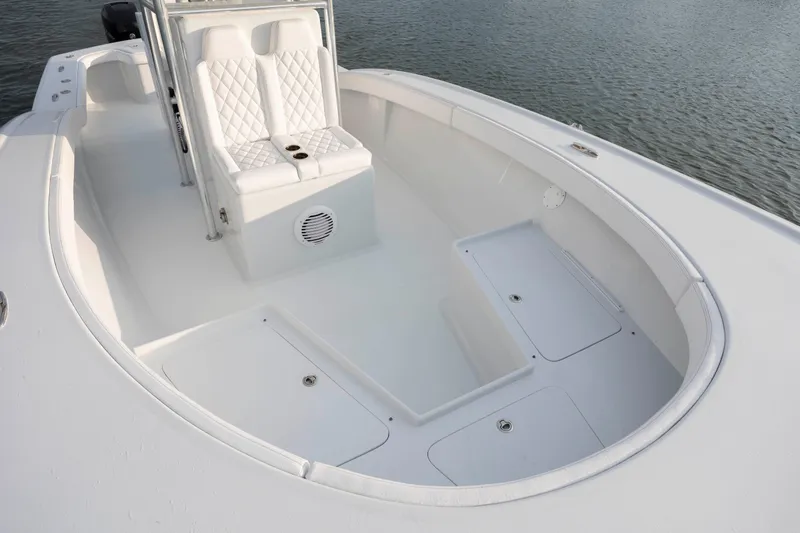  Yacht Photos Pics 2019 Willis 33 Center Console boat with white seating and storage compartments.