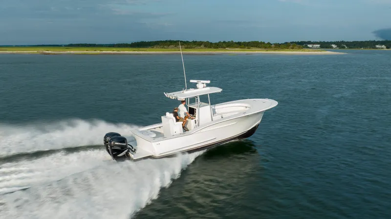  Yacht Photos Pics 2019 Willis 33 Center Console boat cruising on open water.