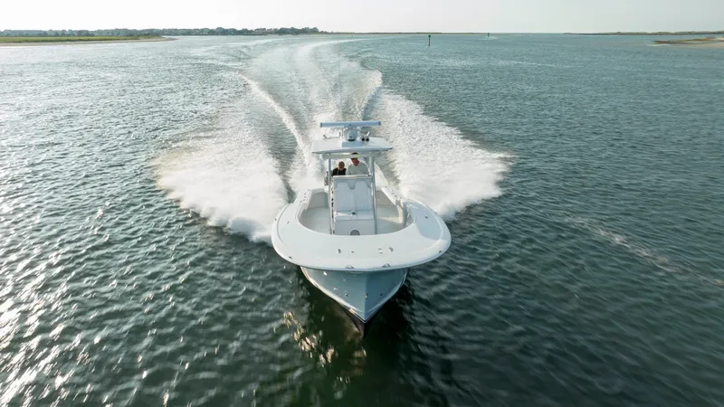  Yacht Photos Pics 2019 Willis 33 Center Console boat cruising on open water.