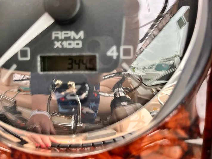 At Last Yacht Photos Pics Close-up of a 2004 Sea Ray 420 Sundancer RPM gauge showing 3442 RPM.