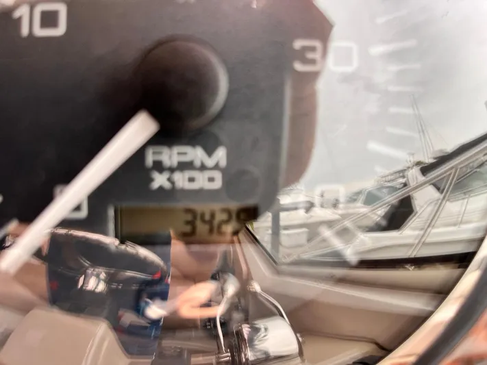 At Last Yacht Photos Pics Close-up of Sea Ray 420 Sundancer 2004 RPM gauge, showing 3429 hours.