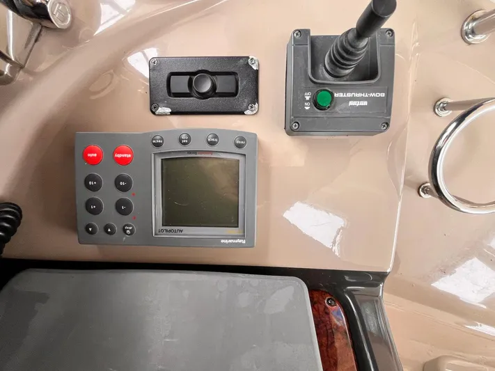 At Last Yacht Photos Pics Control panel of a 2004 Sea Ray 420 Sundancer boat with navigation equipment.