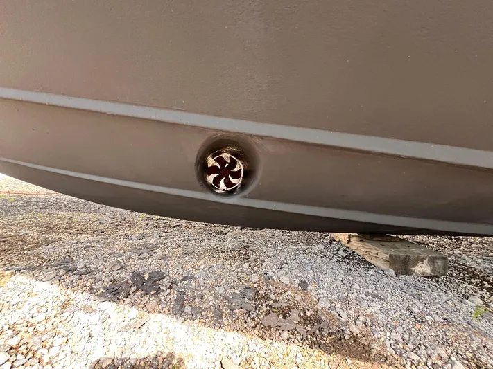 At Last Yacht Photos Pics Bottom view of 2004 Sea Ray 420 Sundancer hull with visible thruster.