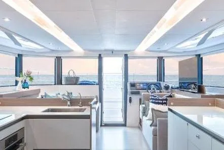  Yacht Photos Pics 2023 Leopard 46 Powercat interior with modern design and ocean view.
