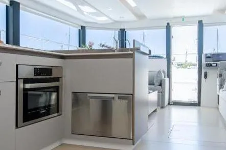  Yacht Photos Pics Modern kitchen interior of 2023 Leopard 46 Powercat yacht with sleek appliances.